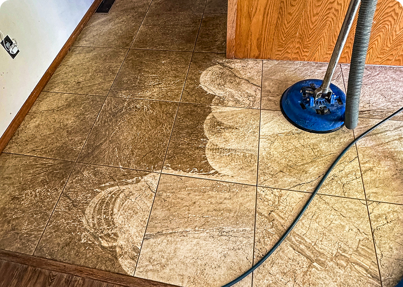 Floor cleaning equipment on tiled surface